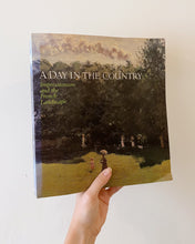 Load image into Gallery viewer, A Day in the Country Coffee Table Book